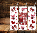 Running on a Dr and Prayer UV DTF tumbler wraps 20oz