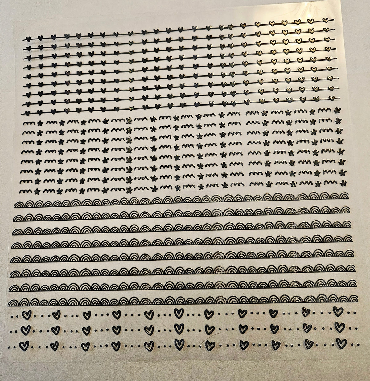 #18 Metallic UV DTF-Doodle Lines- hearts- available in Gold, Black Holo